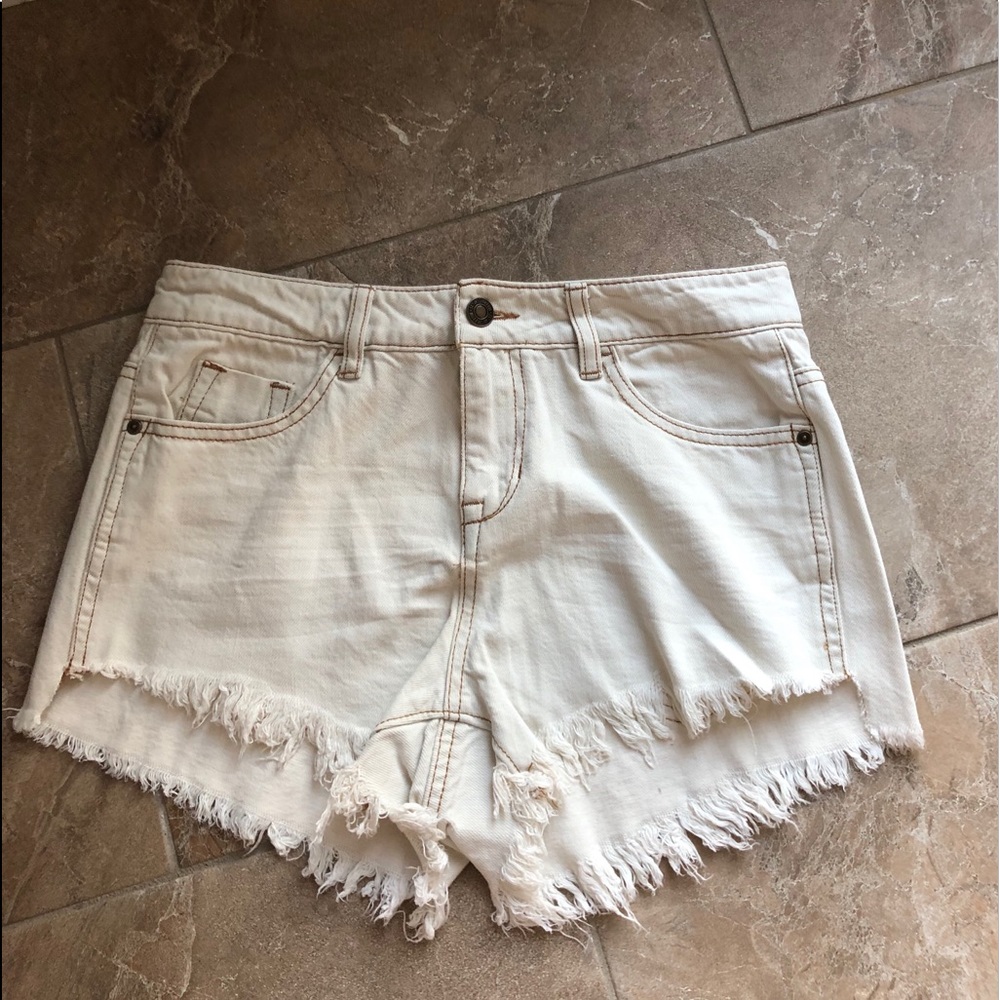 White denim ripped jeans